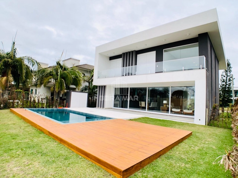 CASA DE LUXO À VENDA NO CONDOMÍNIO LA PLAGE: 1ª foto da galeria de imagens do imóvel