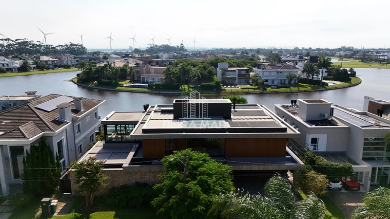 Casa no Condomínio Bosques de Atlântida á beira do lago!: 12ª foto da galeria de imagens do imóvel