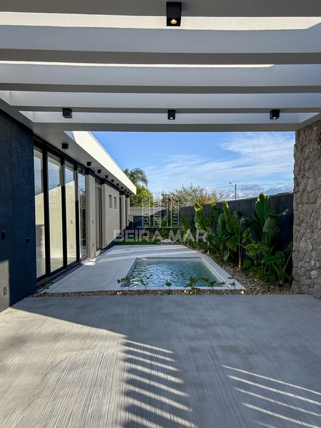 Casa nova e sofisticada em Atlântida: 22ª foto da galeria de imagens do imóvel