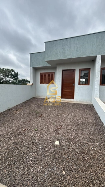 Casa geminada 2 dormitórios no bairro Floresta: 1ª foto da galeria de imagens do imóvel