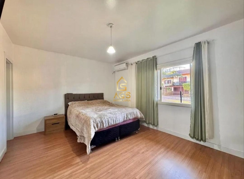 Casa semimobiliada com 3 dormitórios, amplo terreno e excelente localização no Bairro São Cristóvão: 6ª foto da galeria de imagens do imóvel