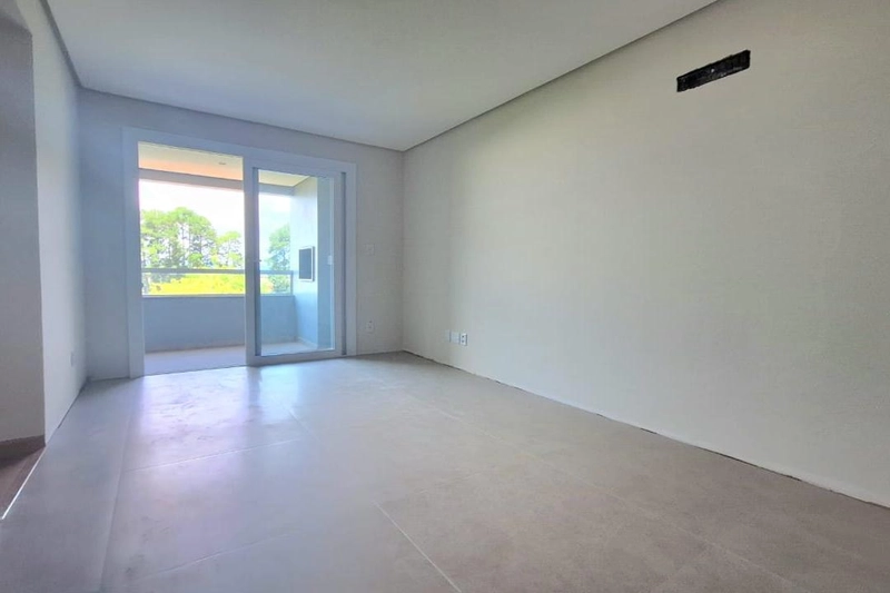 Apartamento amplo de 2 dormitórios no 5 º andar, com sacada, elevador, gas central e salão de festas. REF: 353: 5ª foto da galeria de imagens do imóvel