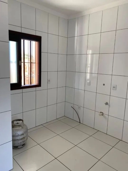 CASA COM 2 DORMITÓRIOS, SENDO 1 SUÍTE!: 3ª foto da galeria de imagens do imóvel