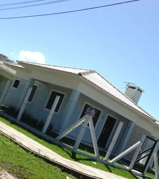 CASA COM 2 DORMITÓRIOS, SENDO 1 SUÍTE!: 2ª foto da galeria de imagens do imóvel