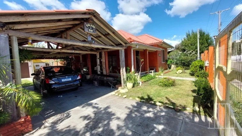 IMPECÁVEL CASA COM ANEXO E TERRENO AMPLO EM ATLÂNTIDA, XANGRI-LÁ: 2ª foto da galeria de imagens do imóvel