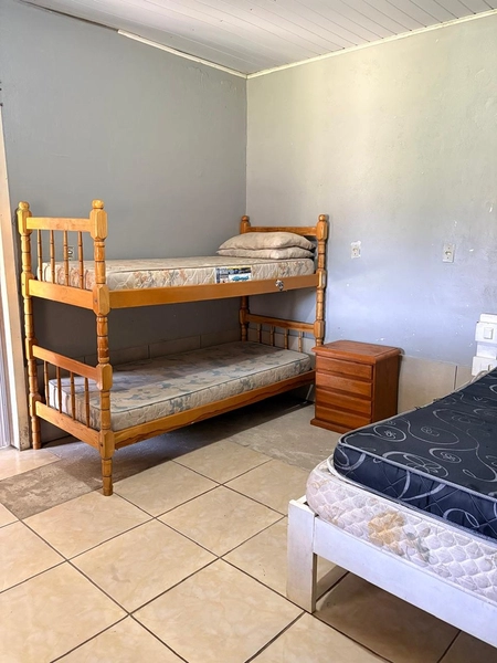 Casa com pátio fechado e churrasqueira no bairro Arco-Íris: 6ª foto da galeria de imagens do imóvel