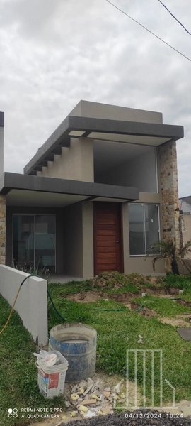 CASA COM 2 DORMITORIOS, SENDO 1 SUITE BEM LOCALIZADO!: 1ª foto da galeria de imagens do imóvel