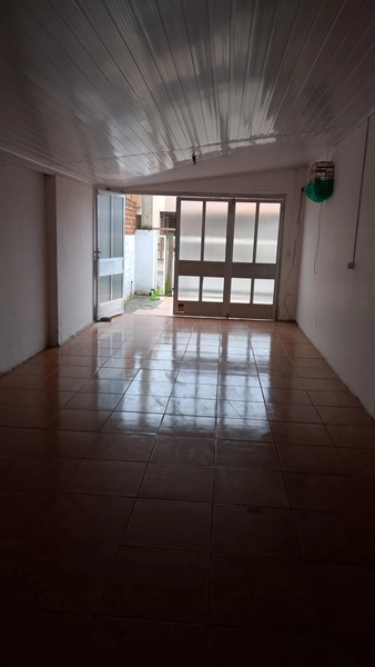 Casa Ampla e Bem Localizada com 3 Dormitórios e Pátio Livre: 14ª foto da galeria de imagens do imóvel