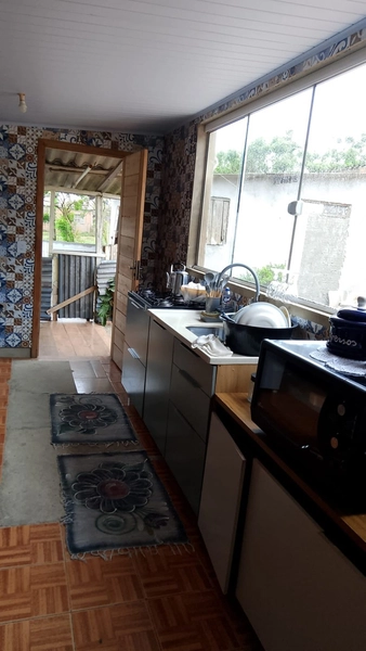 Casa Ampla e Bem Localizada com 3 Dormitórios e Pátio Livre: 2ª foto da galeria de imagens do imóvel