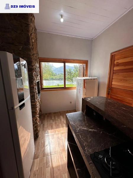 ENCANTADORA CASA À BEIRA DO RIO TRÊS FORQUILHAS: 7ª foto da galeria de imagens do imóvel