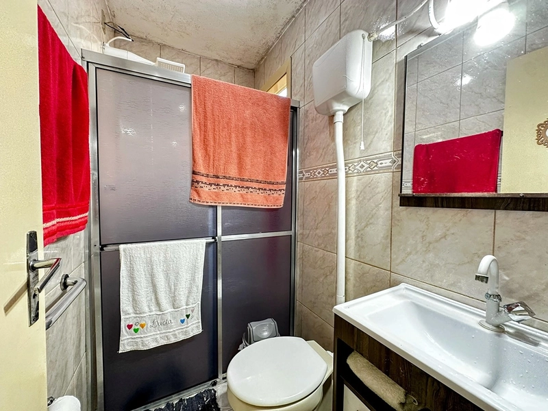 Casa Espaçosa com 3 Dormitórios, Garagem Coberta e Amplo Pátio: 19ª foto da galeria de imagens do imóvel