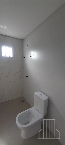 LINDÍSSIMA CASA À VENDA NO BAIRRO PRAIA DO BARCO EM CAPÃO DA CANOA: 8ª foto da galeria de imagens do imóvel