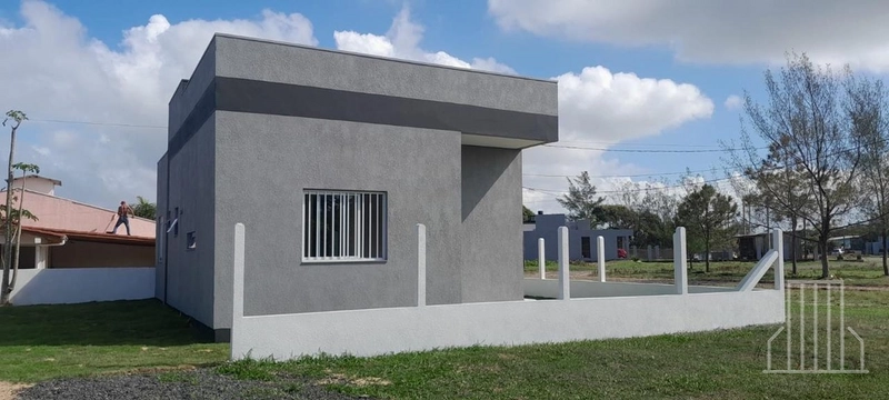 LINDÍSSIMA CASA À VENDA NO BAIRRO PRAIA DO BARCO EM CAPÃO DA CANOA: 1ª foto da galeria de imagens do imóvel