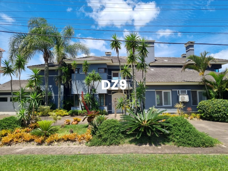 CASA EM CONDOMINIO FECHADO COM 4 SUITES: 2ª foto da galeria de imagens do imóvel