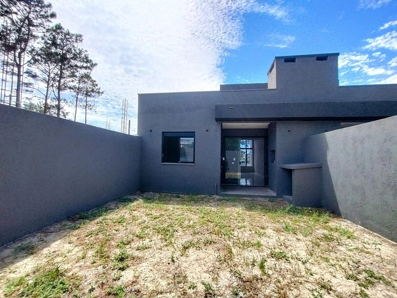 Casa de Alto Padrão a 350 Metros do Mar com Suíte e Pátio Amplo: 16ª foto da galeria de imagens do imóvel