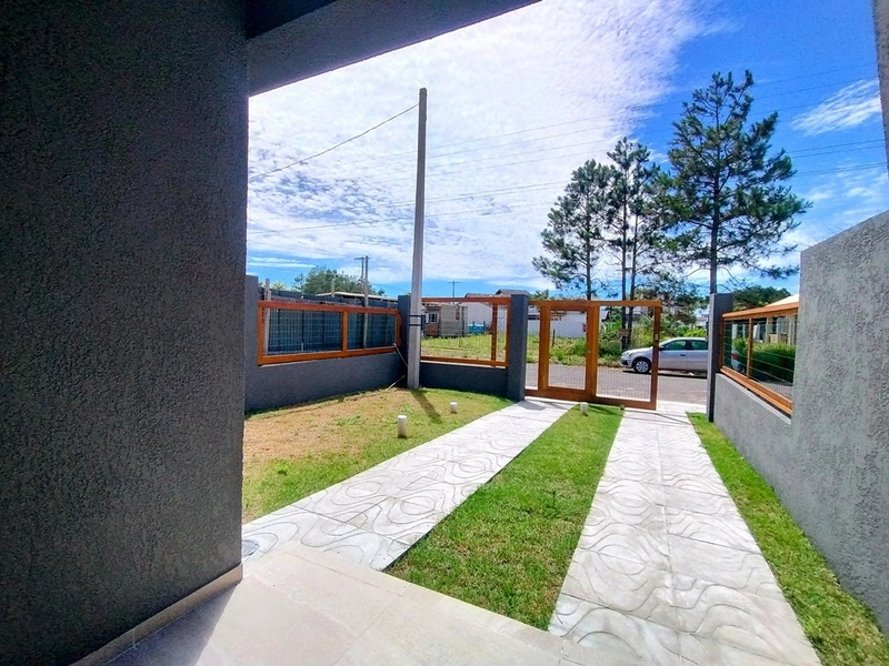 Casa de Alto Padrão a 350 Metros do Mar com Suíte e Pátio Amplo: 22ª foto da galeria de imagens do imóvel