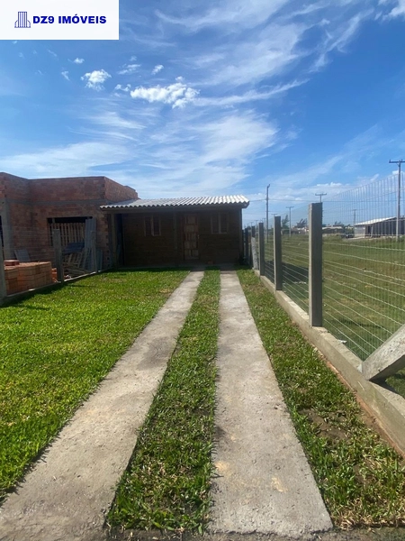 ÓTIMA CASA À VENDA NO BAIRRO CAPÃO NOVO, PRÓXIMA AO MAR: 3ª foto da galeria de imagens do imóvel