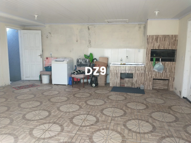 CASA COM 3 DORMITÓRIOS, SENDO 1 SUÍTE, BEM LOCALIZADA!: 2ª foto da galeria de imagens do imóvel