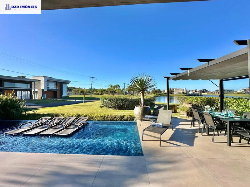 Casa alto padrão, 5 suítes, vista lago, piscina e automação total: 4ª foto da galeria de imagens do imóvel