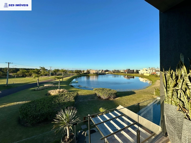 Casa alto padrão, 5 suítes, vista lago, piscina e automação total: 9ª foto da galeria de imagens do imóvel