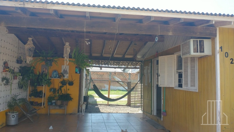 Casa com 2 Dormitórios em Terreno Amplo – Zona Norte de Capão da Canoa: 3ª foto da galeria de imagens do imóvel
