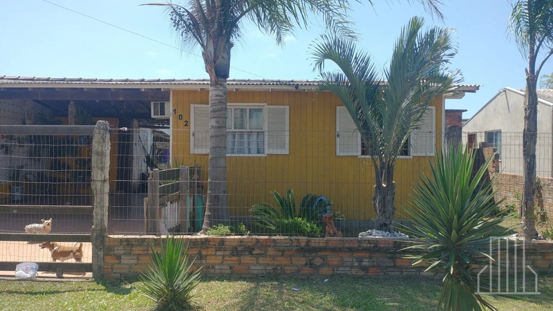 Casa com 2 Dormitórios em Terreno Amplo – Zona Norte de Capão da Canoa: 2ª foto da galeria de imagens do imóvel