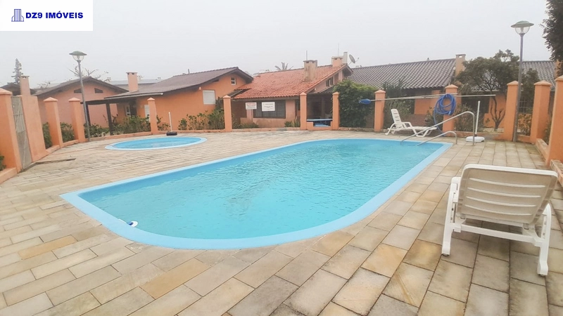 Sobrado com mezanino em Capão Novo: 15ª foto da galeria de imagens do imóvel