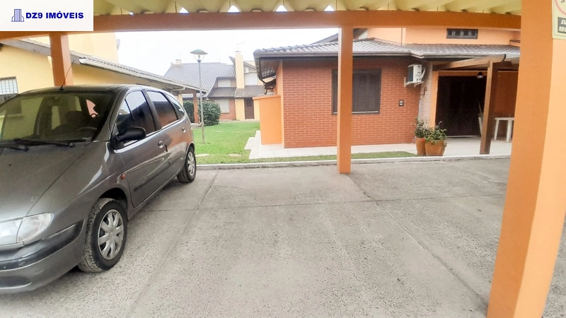 Sobrado com mezanino em Capão Novo: 13ª foto da galeria de imagens do imóvel