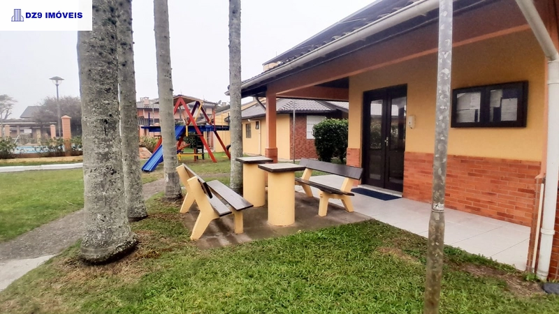 Sobrado com mezanino em Capão Novo: 14ª foto da galeria de imagens do imóvel