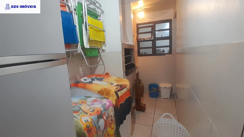 Sobrado com mezanino em Capão Novo: 12ª foto da galeria de imagens do imóvel