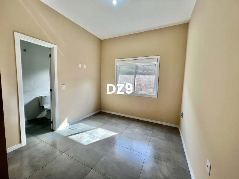 CASA COM 2 DORMITORIOS, SENDO 1 SUITE BEM LOCALIZADO!: 11ª foto da galeria de imagens do imóvel