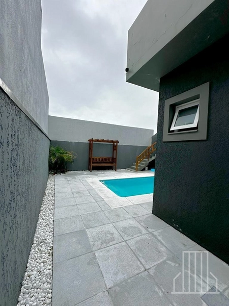 LINDA CASA EM BAIRRO TRANQUILO, A POUCOS PASSOS DO MAR!: 3ª foto da galeria de imagens do imóvel