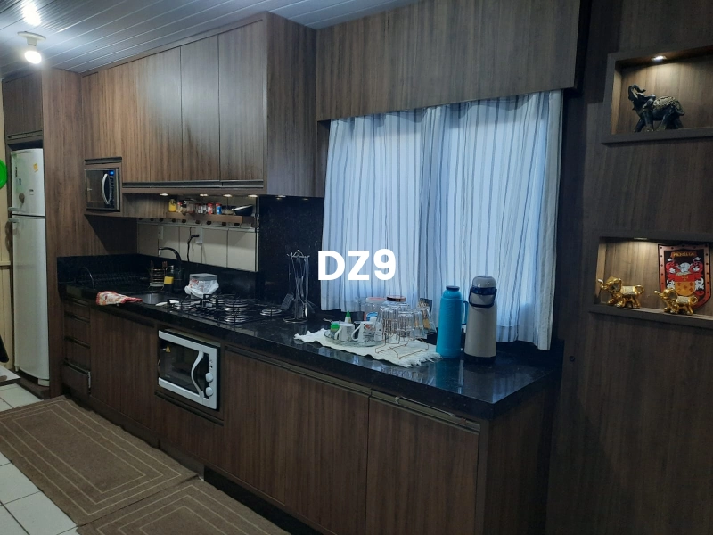 CASA COM 2 DORMITORIOS, SENDO 1 SUITE BEM LOCALIZADA!: 8ª foto da galeria de imagens do imóvel