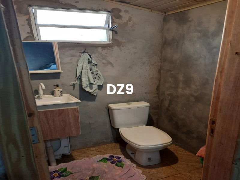 CASA COM 2 DORMITORIOS, SENDO 1 SUITE BEM LOCALIZADA!: 10ª foto da galeria de imagens do imóvel