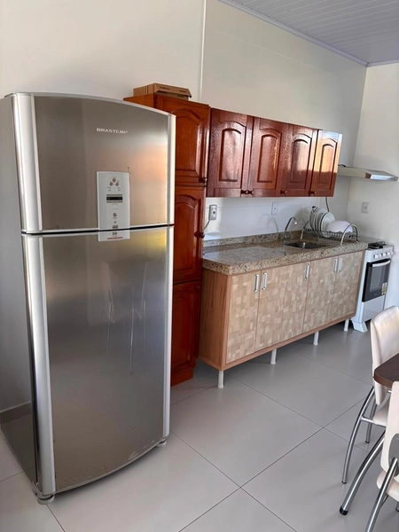 Casa Geminada Mobiliada com 2 Dormitórios e Pátio Privativo: 4ª foto da galeria de imagens do imóvel