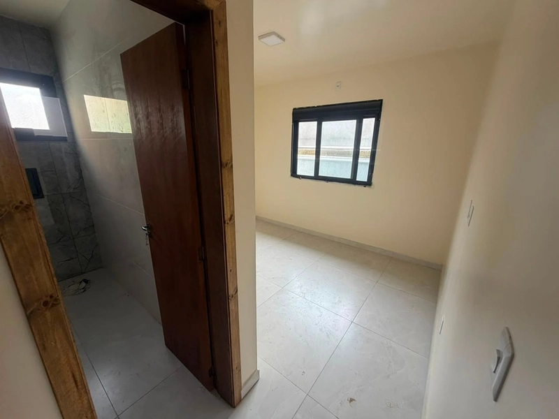 Casa Nova de Alto Padrão a 200m da Beira-Mar | Design Moderno e Conforto: 15ª foto da galeria de imagens do imóvel