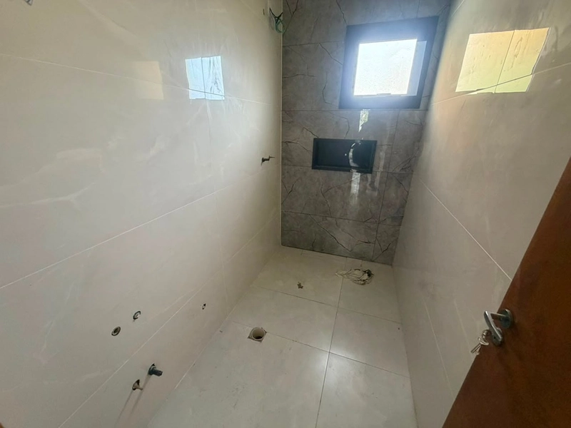 Casa Nova de Alto Padrão a 200m da Beira-Mar | Design Moderno e Conforto: 19ª foto da galeria de imagens do imóvel