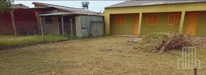 EXCELENTE TERRENO COM DUAS CASAS INDIVIDUAIS À VENDA EM CAPÃO DA CANOA: 1ª foto da galeria de imagens do imóvel