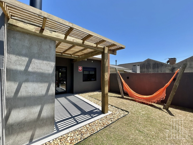 LINDA CASA GEMINADA LOCALIZADA NO BAIRRO CAPÃO NOVO EM CAPÃO DA CANOA!: 5ª foto da galeria de imagens do imóvel