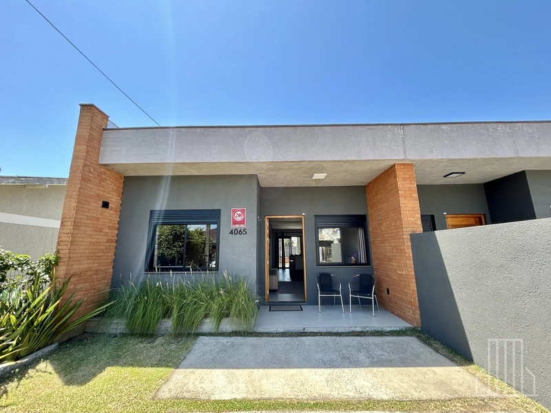 LINDA CASA GEMINADA LOCALIZADA NO BAIRRO CAPÃO NOVO EM CAPÃO DA CANOA!: 2ª foto da galeria de imagens do imóvel