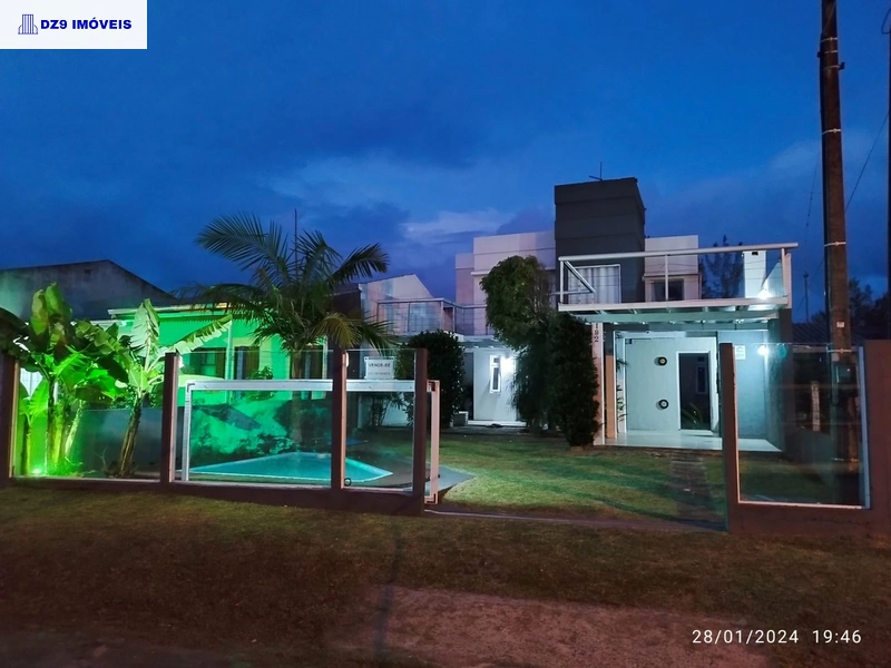 DESLUMBRANTE SOBRADO A UMA QUADRA DO MAR EM CAPÃO DA CANOA: 26ª foto da galeria de imagens do imóvel