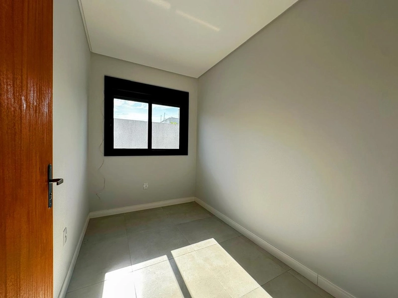 Casa de 3 Dormitórios com Suíte, Pátio Amplo e a 500m do Mar: 10ª foto da galeria de imagens do imóvel