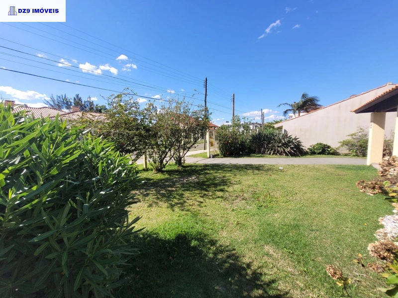 ENCANTADORA CASA ESTILO CHALÉ NA ZONA NOVA: 3ª foto da galeria de imagens do imóvel