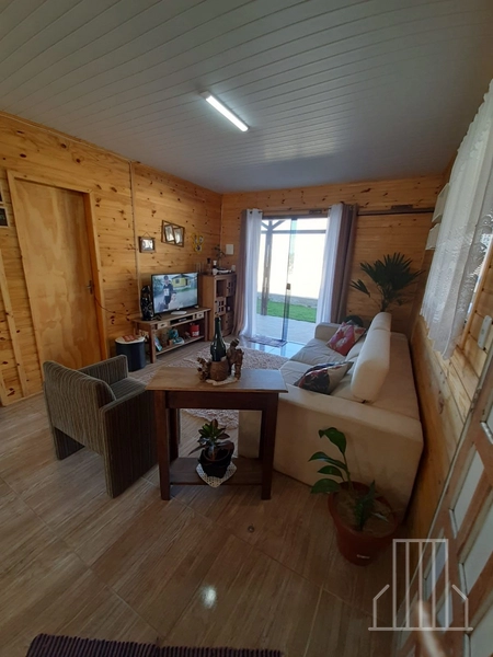 ÓTIMA CASA DE MADEIRA COM 3 DORMITÓRIOS EM CAPÃO NOVO!: 6ª foto da galeria de imagens do imóvel