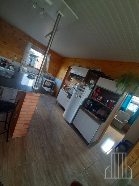 ÓTIMA CASA DE MADEIRA COM 3 DORMITÓRIOS EM CAPÃO NOVO!: 5ª foto da galeria de imagens do imóvel