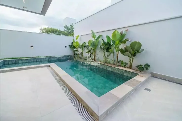 Casa com 3 dormitórios à venda, 247 m² por R$ 2.050.000,00 - Condomínio Arts - U: 3ª foto da galeria de imagens do imóvel