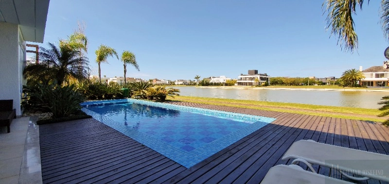 Casa no Condomínio BOSQUES DE ATLÂNTIDA, Xangri-Lá: 2ª foto da galeria de imagens do imóvel