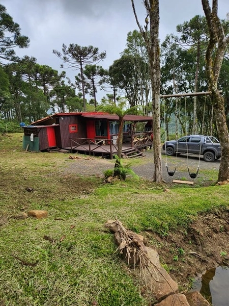 Terreno com Casa: 2ª foto da galeria de imagens do imóvel