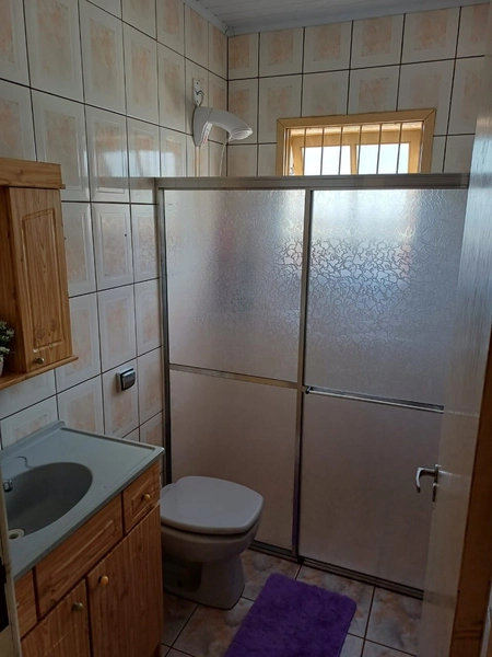 CASA 3 DORMITÓRIOS COM GARAGEM AMPLA COM CHURRASQUEIRA...: 6ª foto da galeria de imagens do imóvel