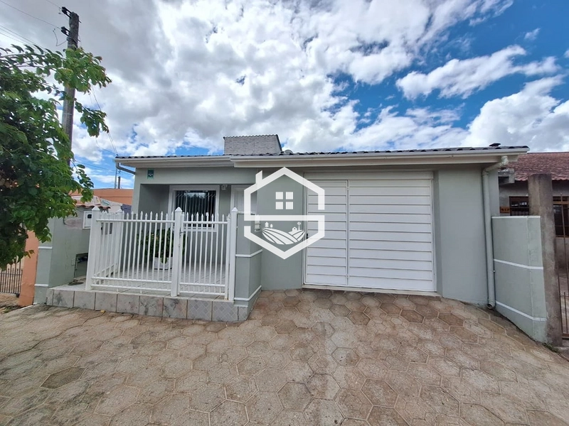 CASA NO OLARIA COM GARAGEM E SUÍTE.: 1ª foto da galeria de imagens do imóvel